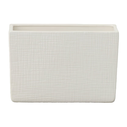 A ceramic wide rectangle vase with a matte finish and embossed wavy pattern design in white color.