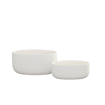 Two white textured planters on a white background