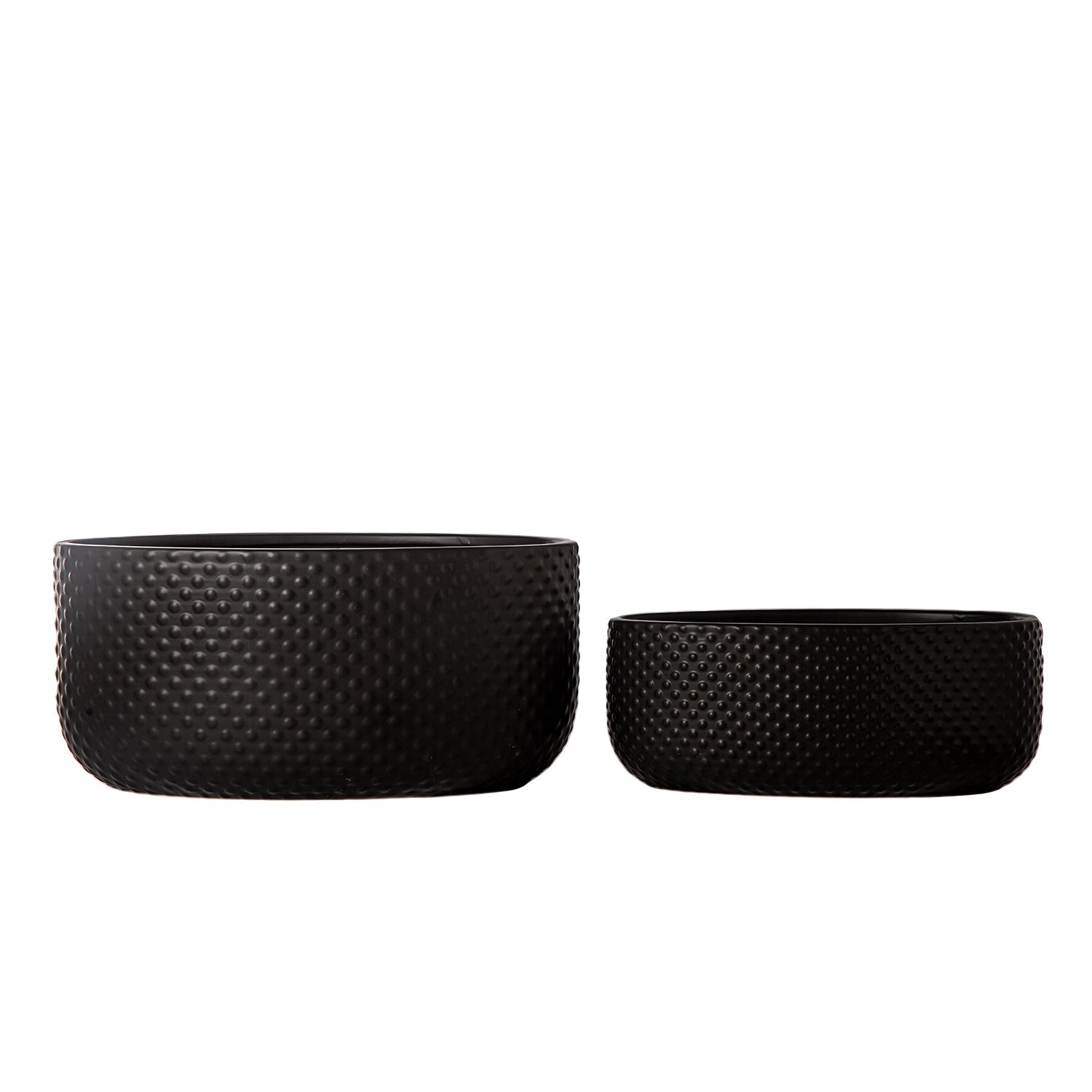 Two black woven bowls on a white background