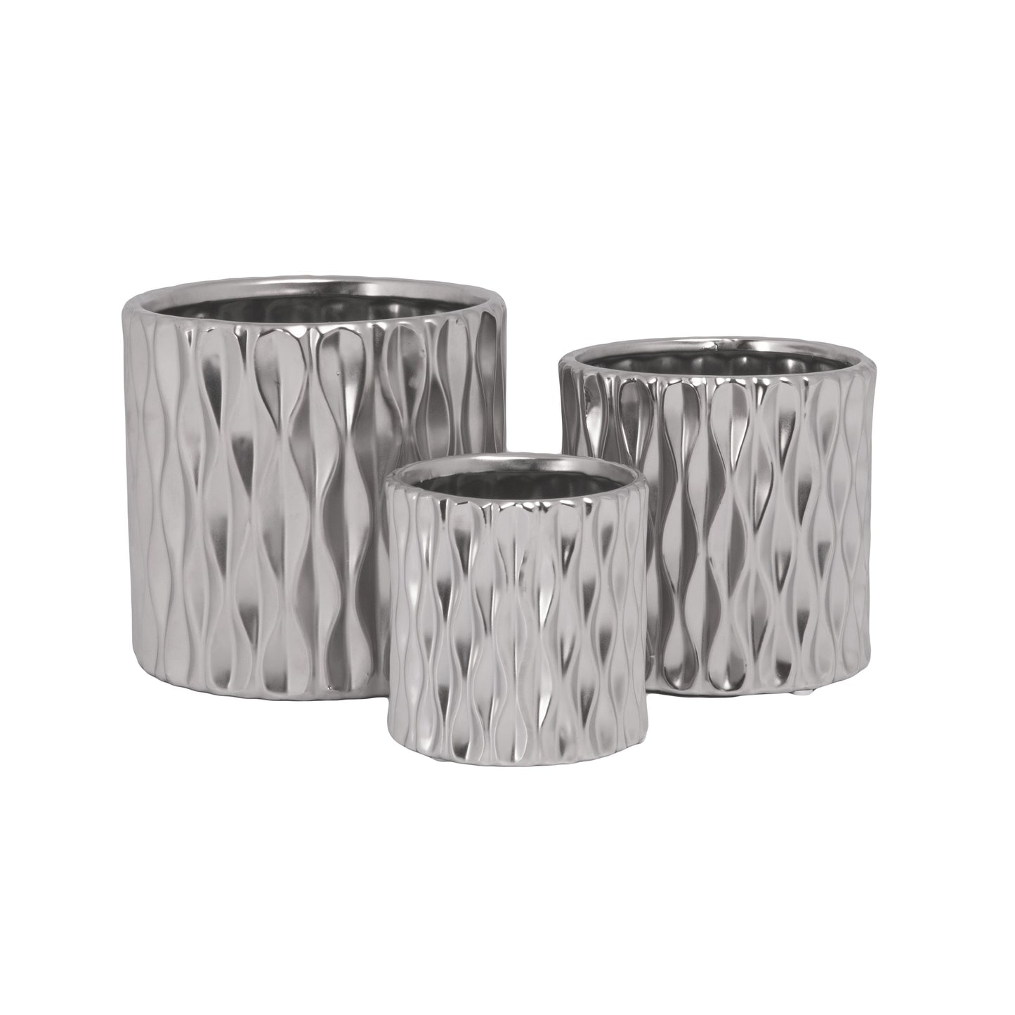 Set of three silver textured metal planters on a white background